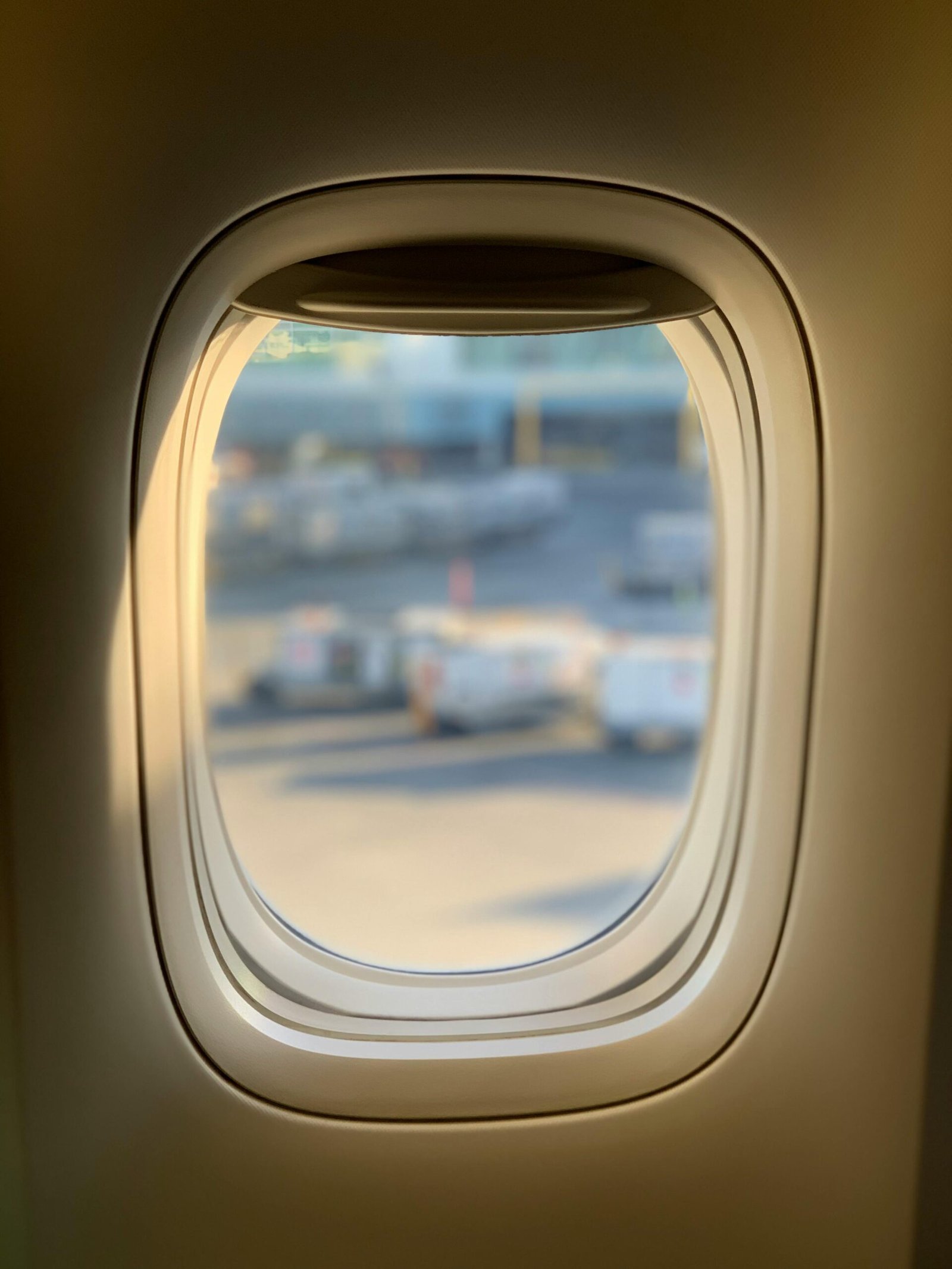 View from an airplane window overlooking the tarmac at Richmond Airport, BC, Canada.